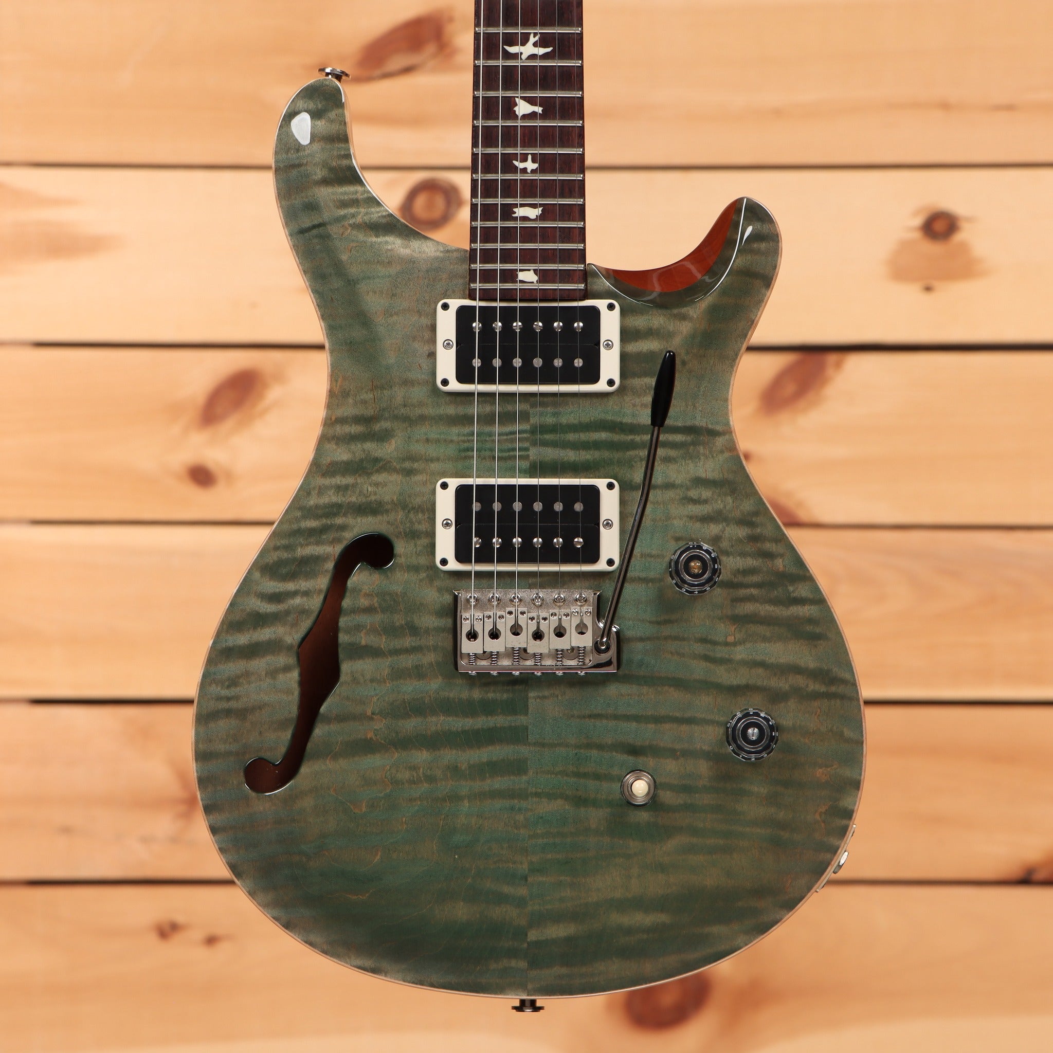 PRS CE 24 Semi-Hollow electric guitar Trampas Green flamed maple top with dual humbuckers and tremolo bridge