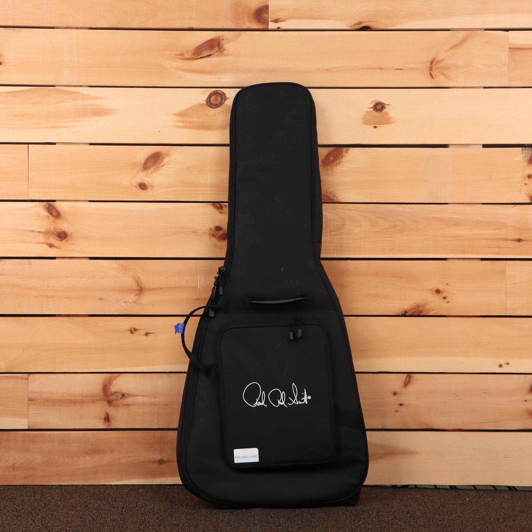 PRS CE 24 Semi-Hollow guitar gig bag black padded soft case with PRS signature logo and front pocket