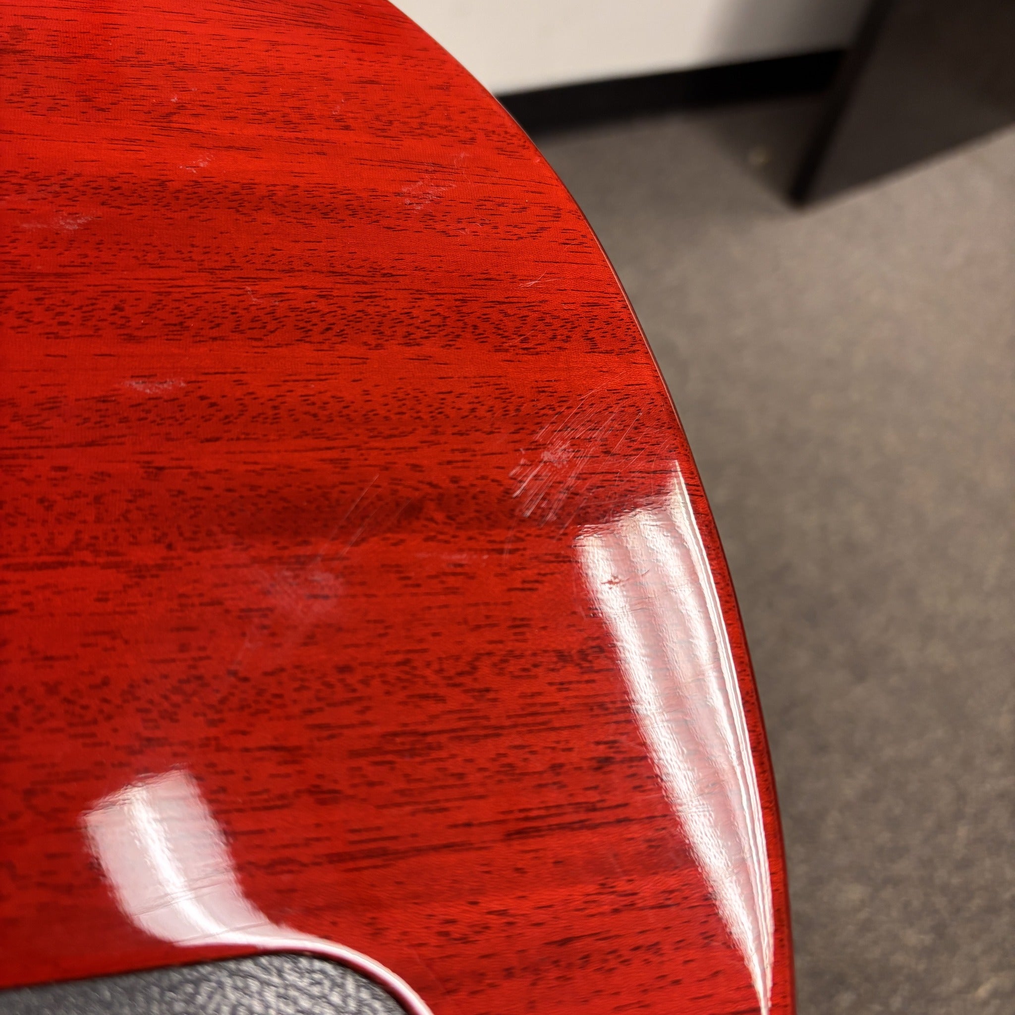 Gibson Les Paul Traditional electric guitar Heritage Cherry Sunburst with gloss mahogany body and visible surface scratches