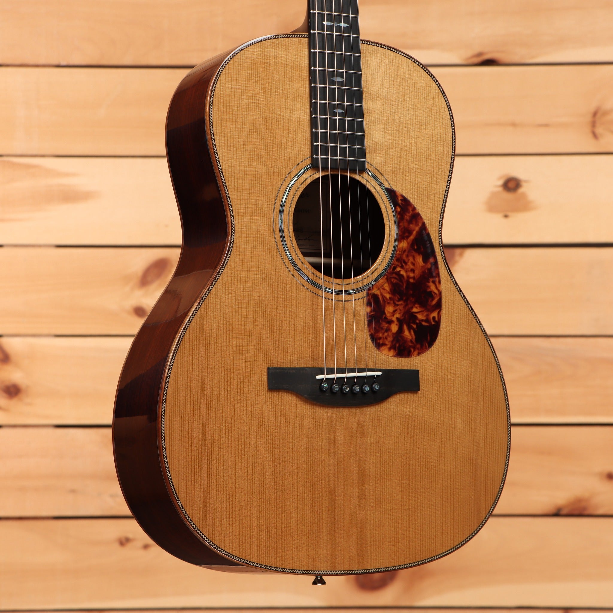 Boucher HG-56-M natural acoustic guitar with Adirondack spruce top, herringbone binding, and tortoise pickguard