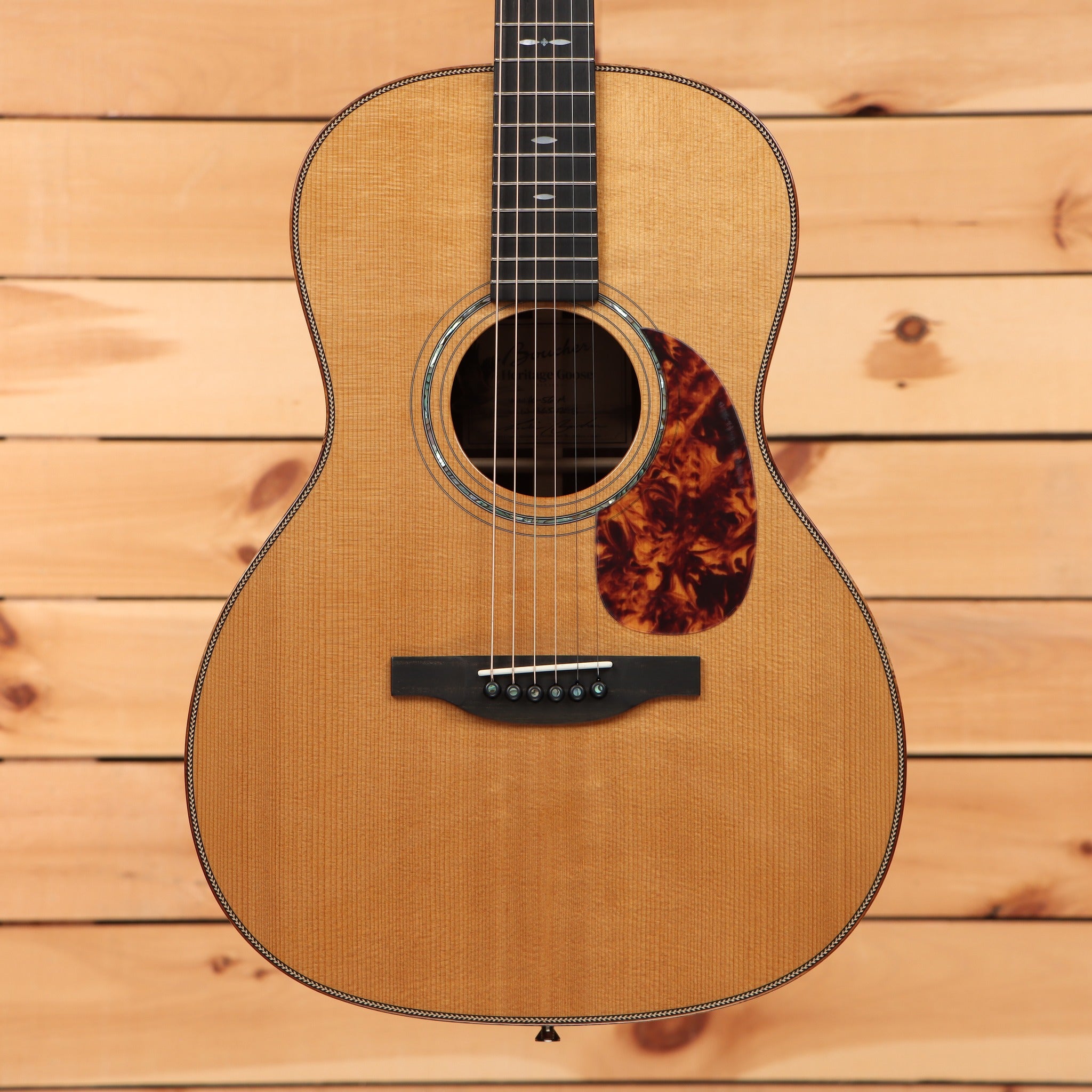 Boucher HG-56-M acoustic guitar natural finish with spruce top tortoise pickguard and herringbone binding