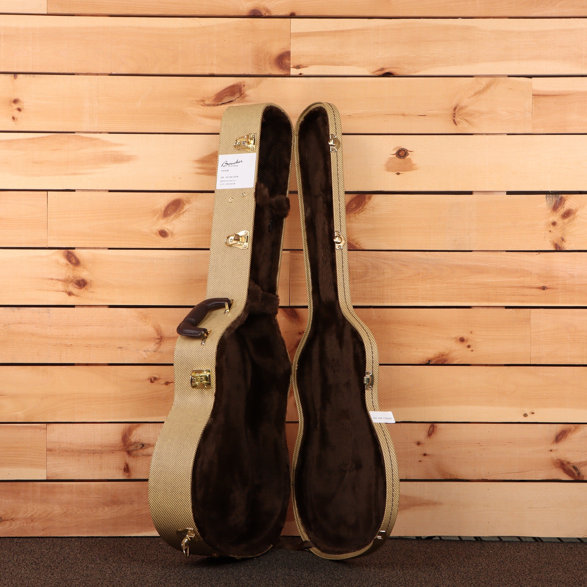 Boucher HG-56-M acoustic guitar hardshell case tweed exterior with brown plush interior and gold hardware latches