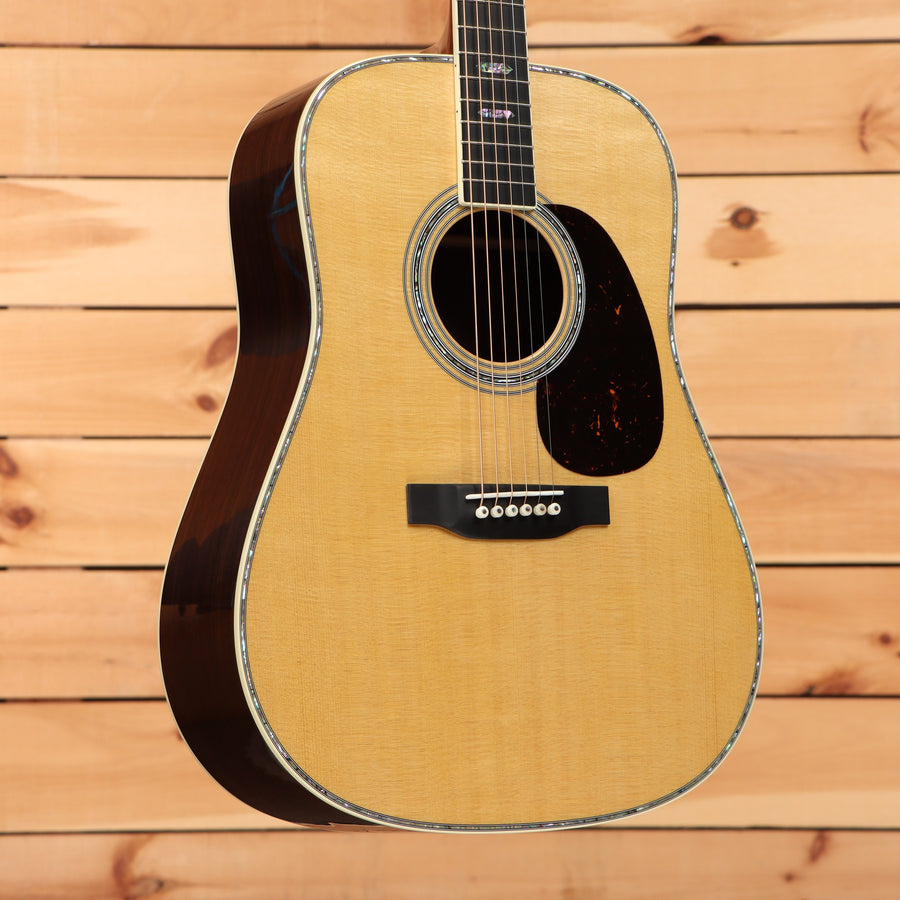 Martin D-41 dreadnought acoustic guitar Natural with herringbone-style abalone binding and tortoise pickguard