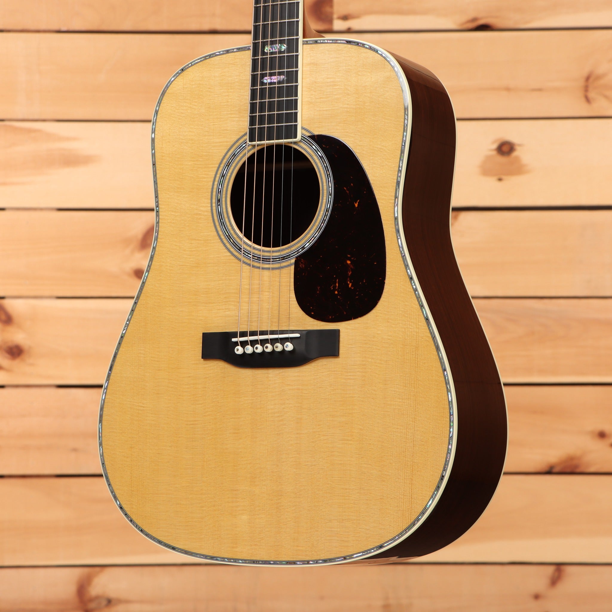 Martin D-41 dreadnought acoustic guitar Natural with herringbone-style body binding and tortoise pickguard