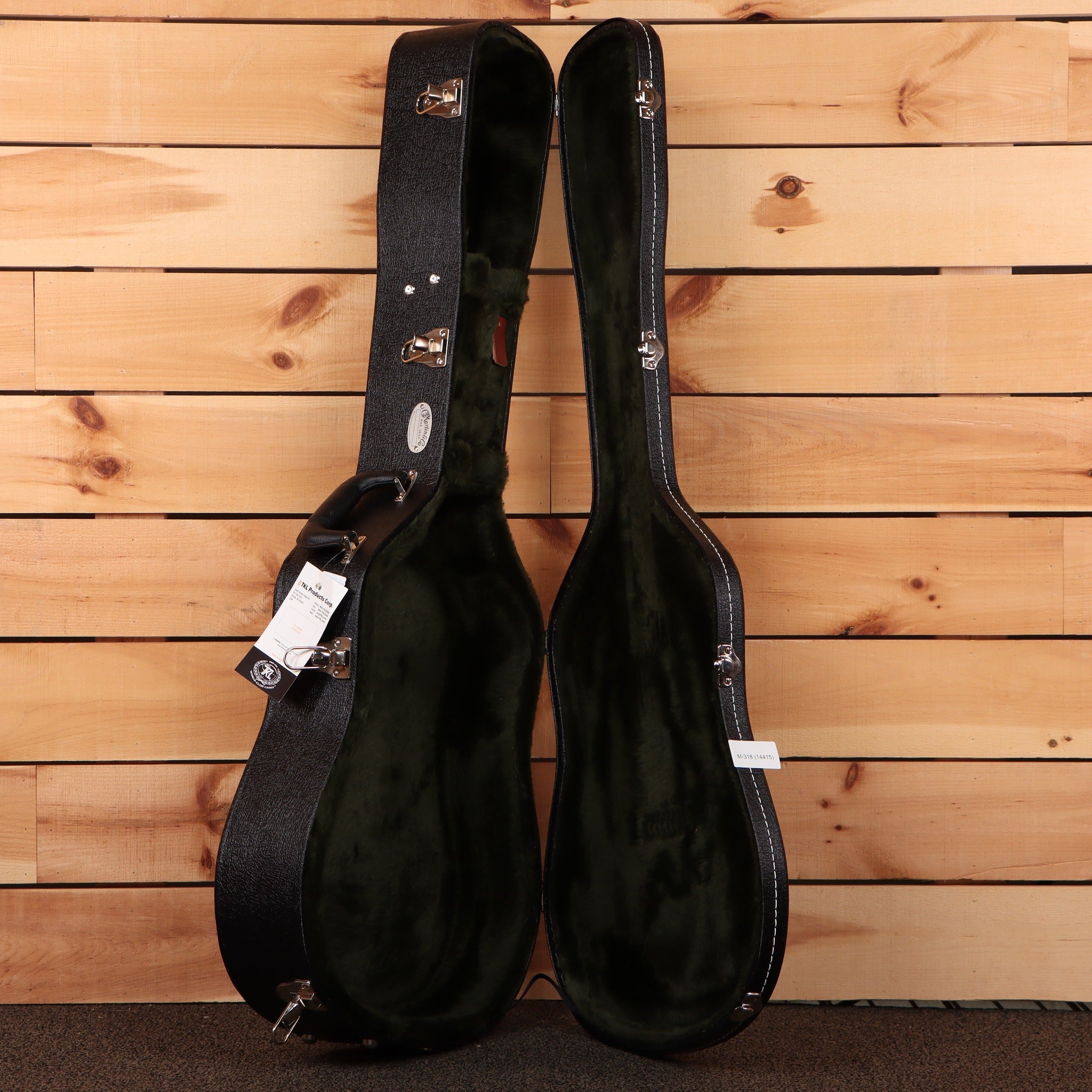 Martin D-28 Billy Strings acoustic guitar hardshell case open black exterior green plush interior silver latches