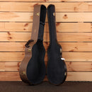 Taylor 714e Gold Label acoustic-electric guitar hardshell case brown exterior black interior with gold hardware latches