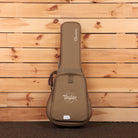 Taylor GS Mini acoustic guitar gig bag tan padded case with front accessory pocket and backpack straps