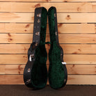 Bourgeois Country Boy/TS acoustic guitar hardshell case open black exterior with green velvet interior
