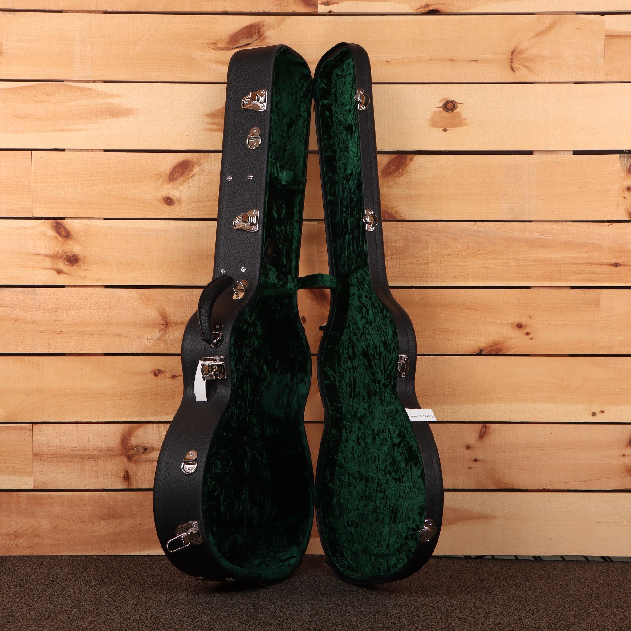 Bourgeois Country Boy/TS acoustic guitar hardshell case open black exterior with green velvet interior