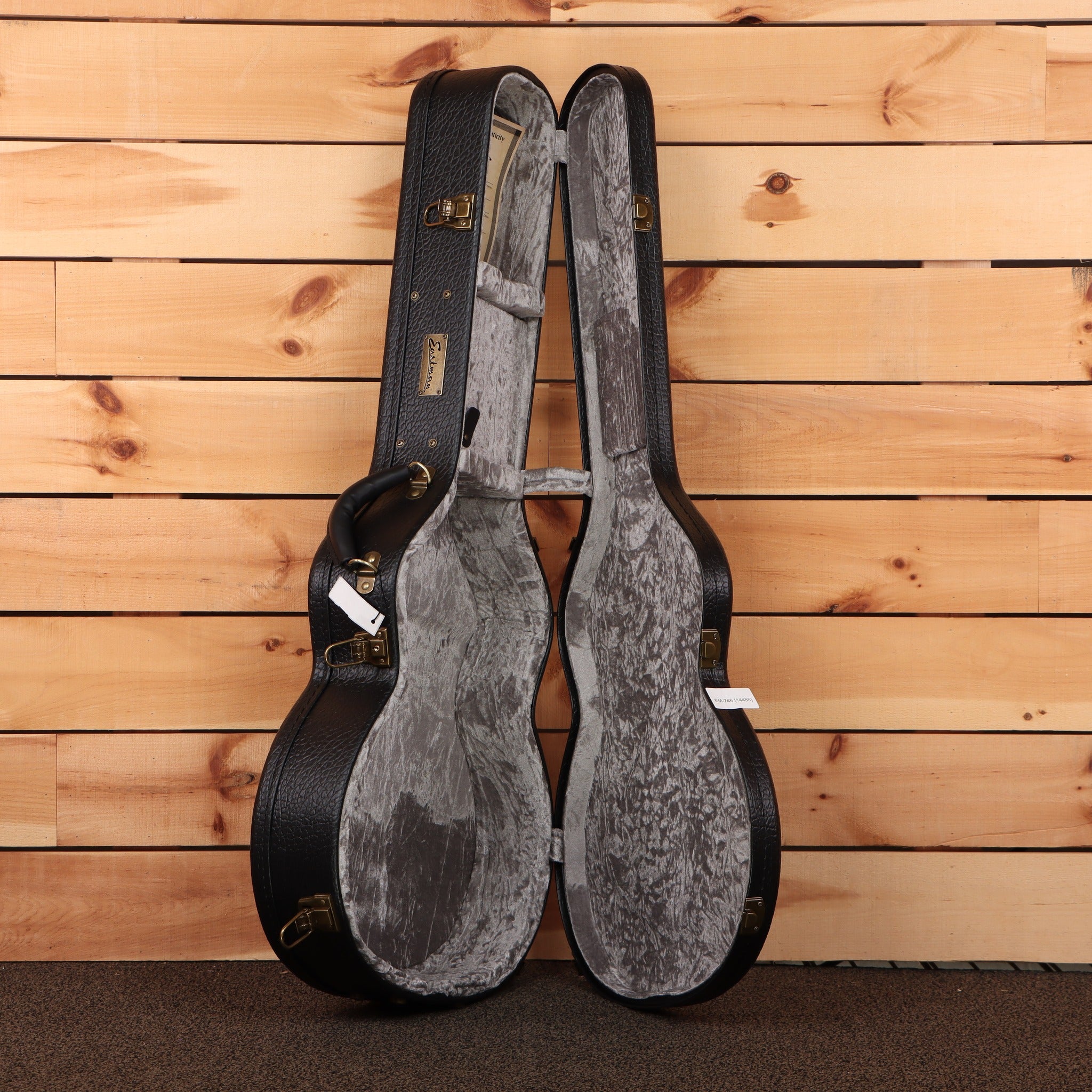 Eastman AC522CE-GB acoustic-electric guitar hardshell case black exterior with gray plush interior and gold hardware latches