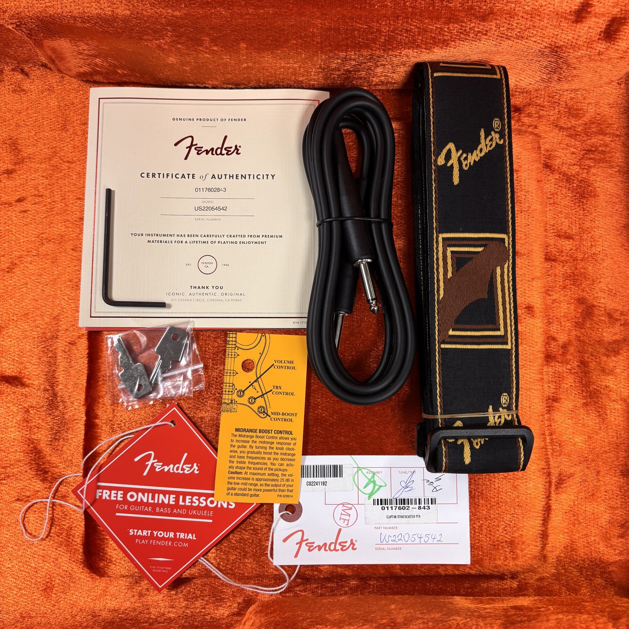 Fender Eric Clapton Stratocaster Pewter accessories bundle with certificate of authenticity, guitar strap, and cable