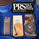 PRS McCarty 594 Hollowbody II Wood Library guitar case interior with Brazilian rosewood tag and documentation