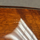 Taylor K28e acoustic-electric guitar Shaded Edgeburst showing figured koa back with visible finish crack detail