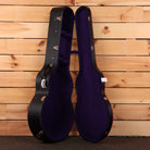Gibson Pre-War SJ-200 Rosewood hardshell guitar case open showing purple velvet interior with chrome latches