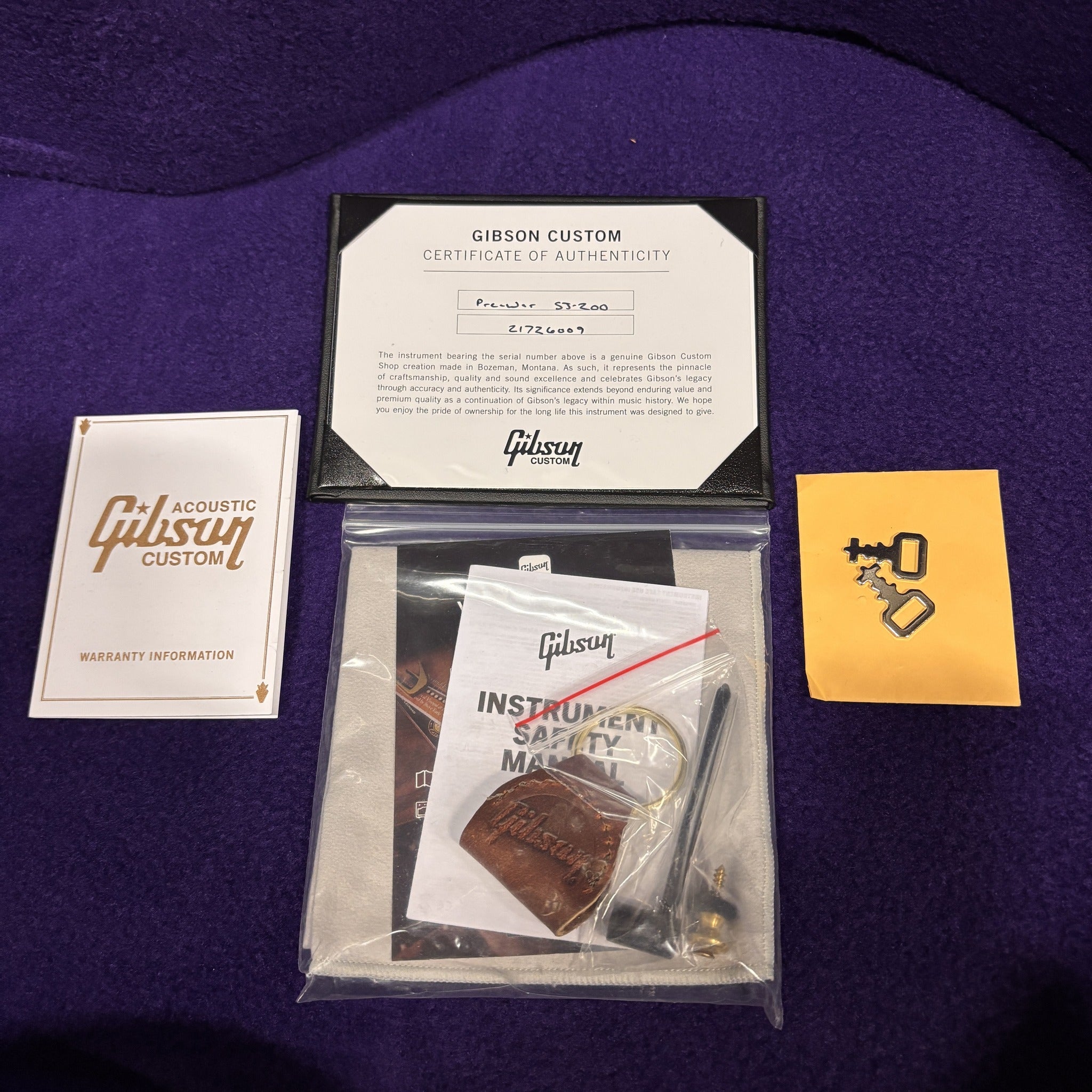 Gibson Custom Pre-War SJ-200 Rosewood Vintage Sunburst certificate of authenticity with warranty card and accessories