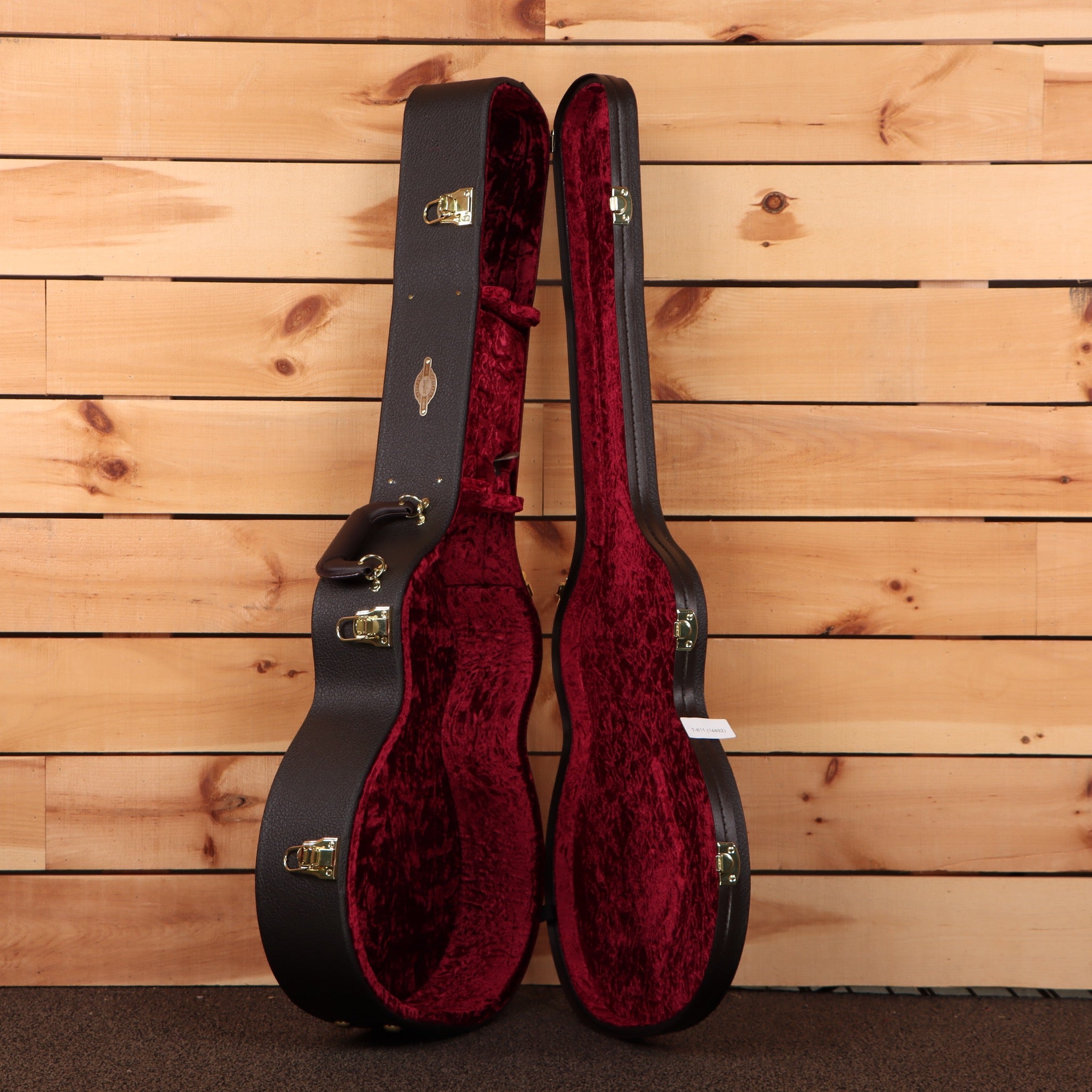 Taylor 414ce Next Generation guitar hardshell case black exterior red velvet interior with gold latches