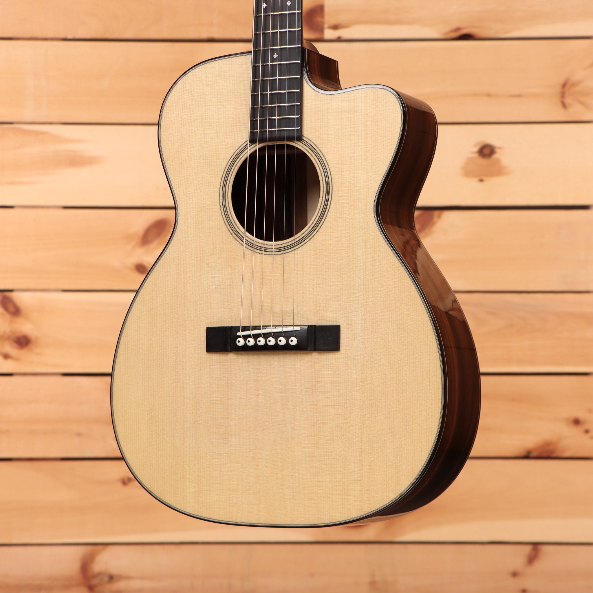 Bourgeois Touchstone Soloist OMC acoustic-electric guitar Natural with Venetian cutaway and spruce top with ebony binding