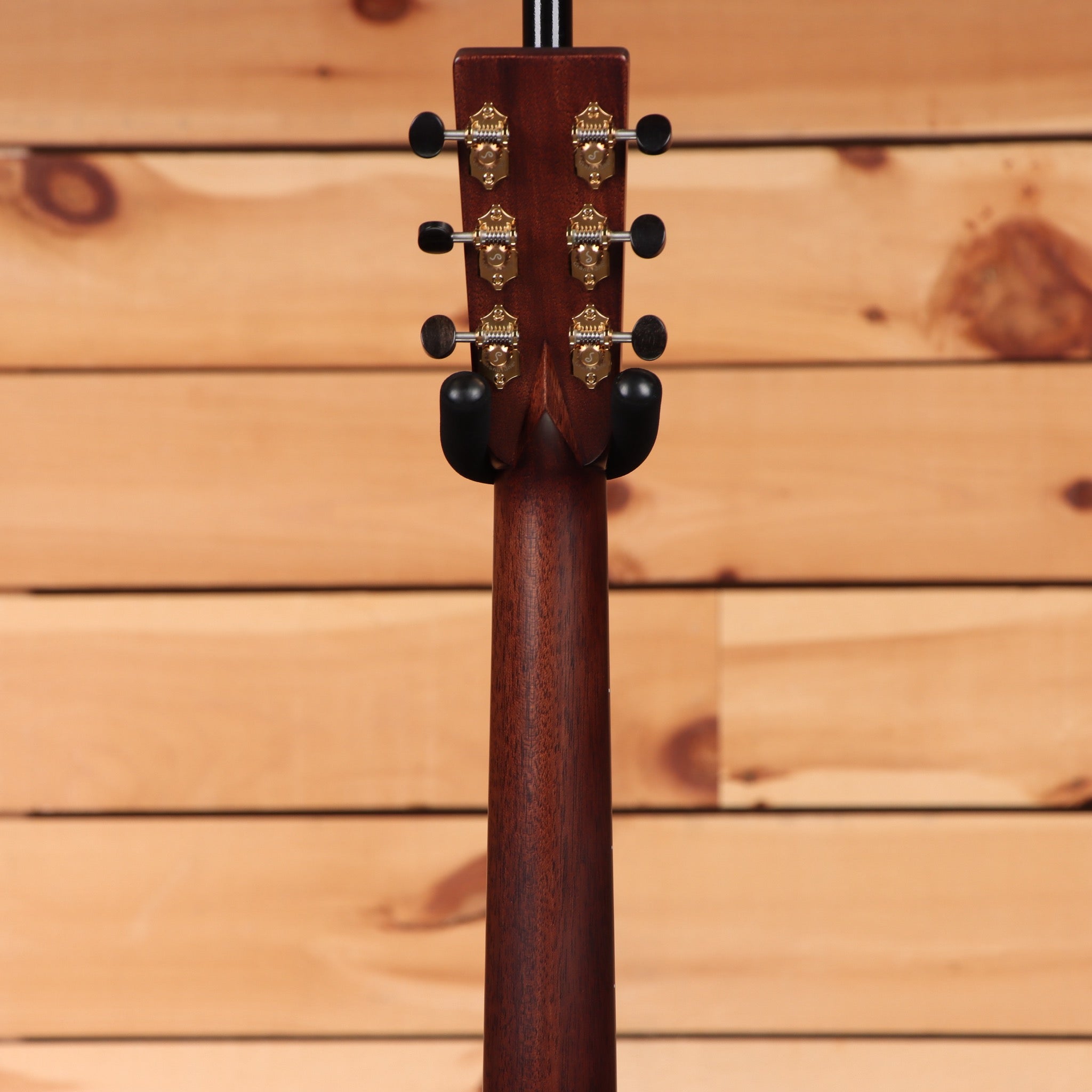 Bourgeois Touchstone Soloist OMC acoustic guitar Natural showing mahogany neck back with gold tuning machines