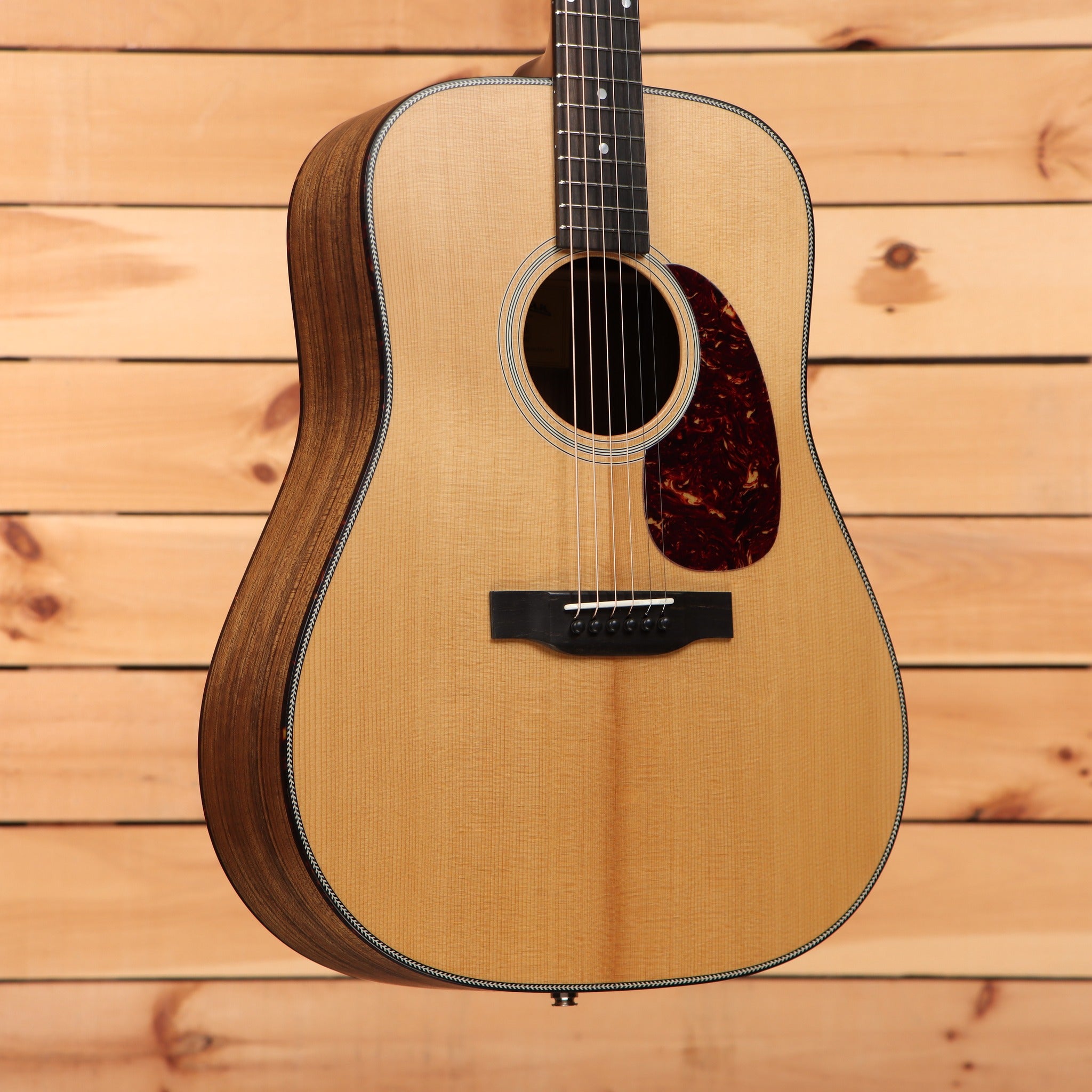 Eastman E3DE dreadnought acoustic guitar natural finish with spruce top, tortoise pickguard, and herringbone binding