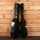 Martin 00-18 Joe Bonamassa guitar hardshell case open black exterior green plush interior with silver latches