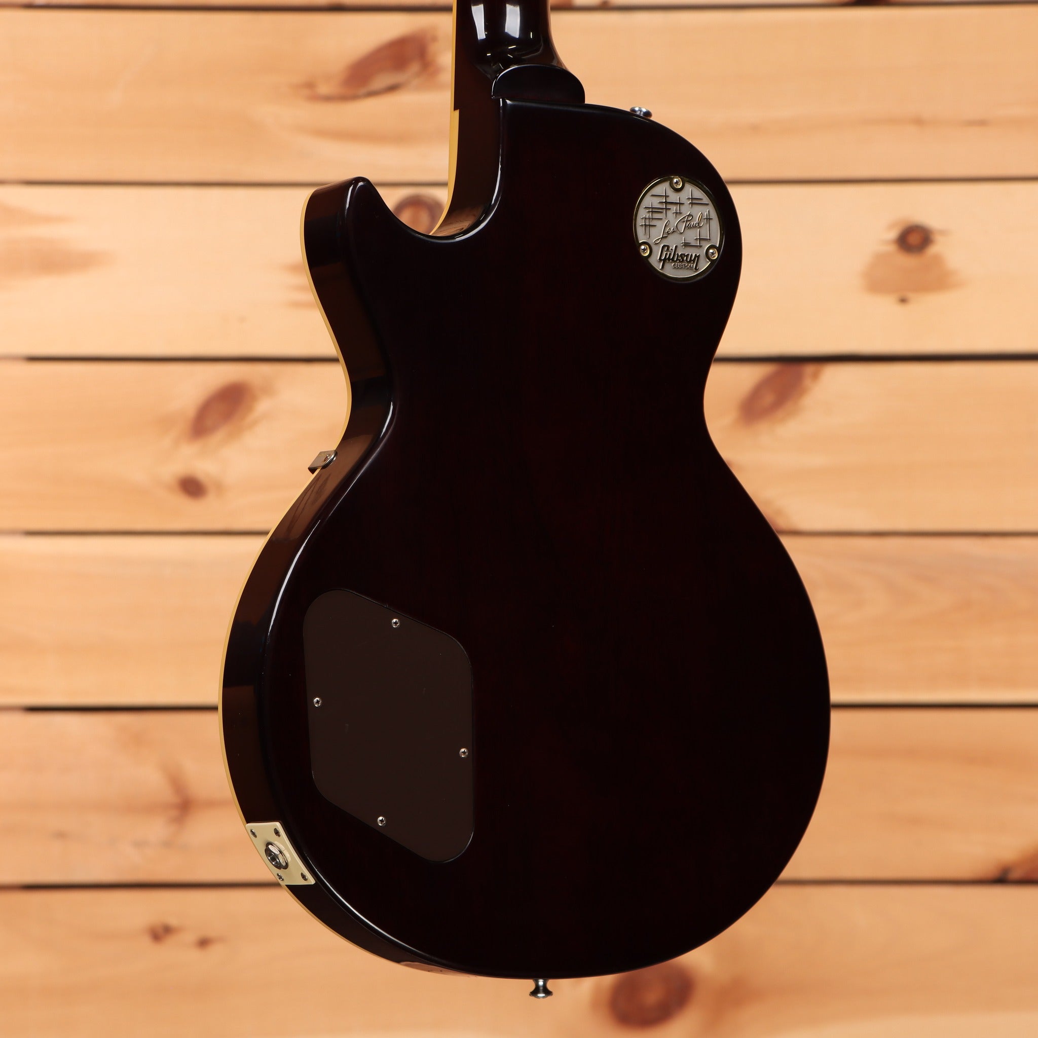 Gibson 1957 Les Paul Goldtop Darkback Reissue Double Gold electric guitar back view with Les Paul medallion plate