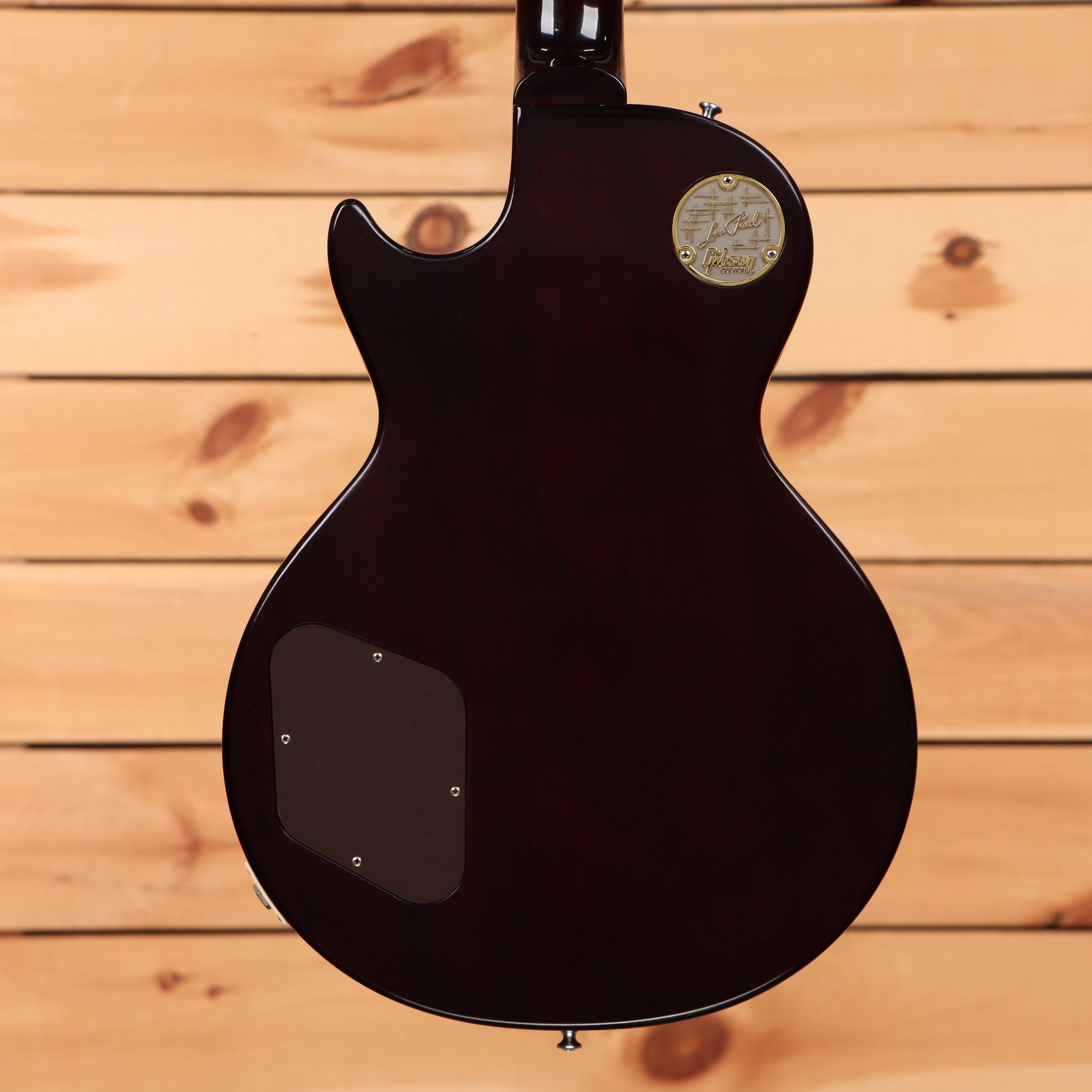 Gibson 1957 Les Paul Goldtop Darkback Reissue Double Gold electric guitar back view with gold Les Paul medallion