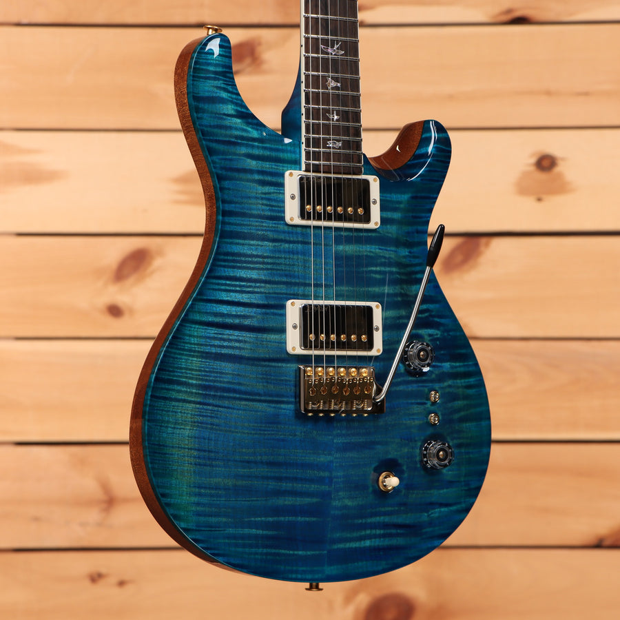 PRS Wood Library McCarty Tremolo electric guitar Arctic Blue with flamed maple top and dual humbuckers