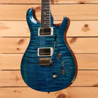 PRS Wood Library McCarty Tremolo electric guitar Arctic Blue with flamed maple top and dual humbuckers