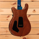 PRS Wood Library McCarty Tremolo electric guitar Arctic Blue mahogany back with gold hardware and tremolo cavity cover