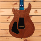 PRS Wood Library McCarty Tremolo electric guitar Arctic Blue with mahogany back and gold hardware back view