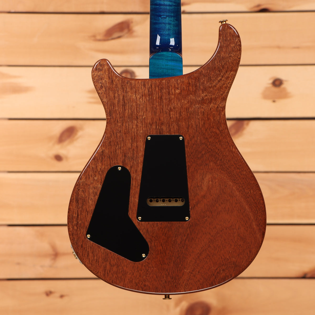 PRS Wood Library McCarty Tremolo electric guitar Arctic Blue with mahogany back and gold hardware back view