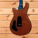 PRS Wood Library McCarty Tremolo electric guitar Arctic Blue with mahogany back and gold hardware