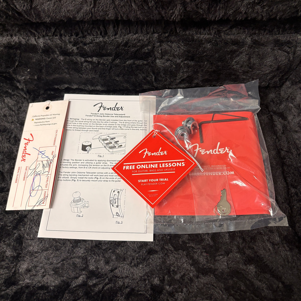 Fender John Osborne Telecaster Olympic White accessories package with B-bender hardware, strap locks, manual, and case key