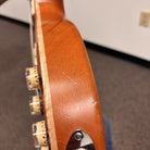 Tom Anderson Bulldog electric guitar Satin Natural Red showing mahogany neck back with chrome tuners