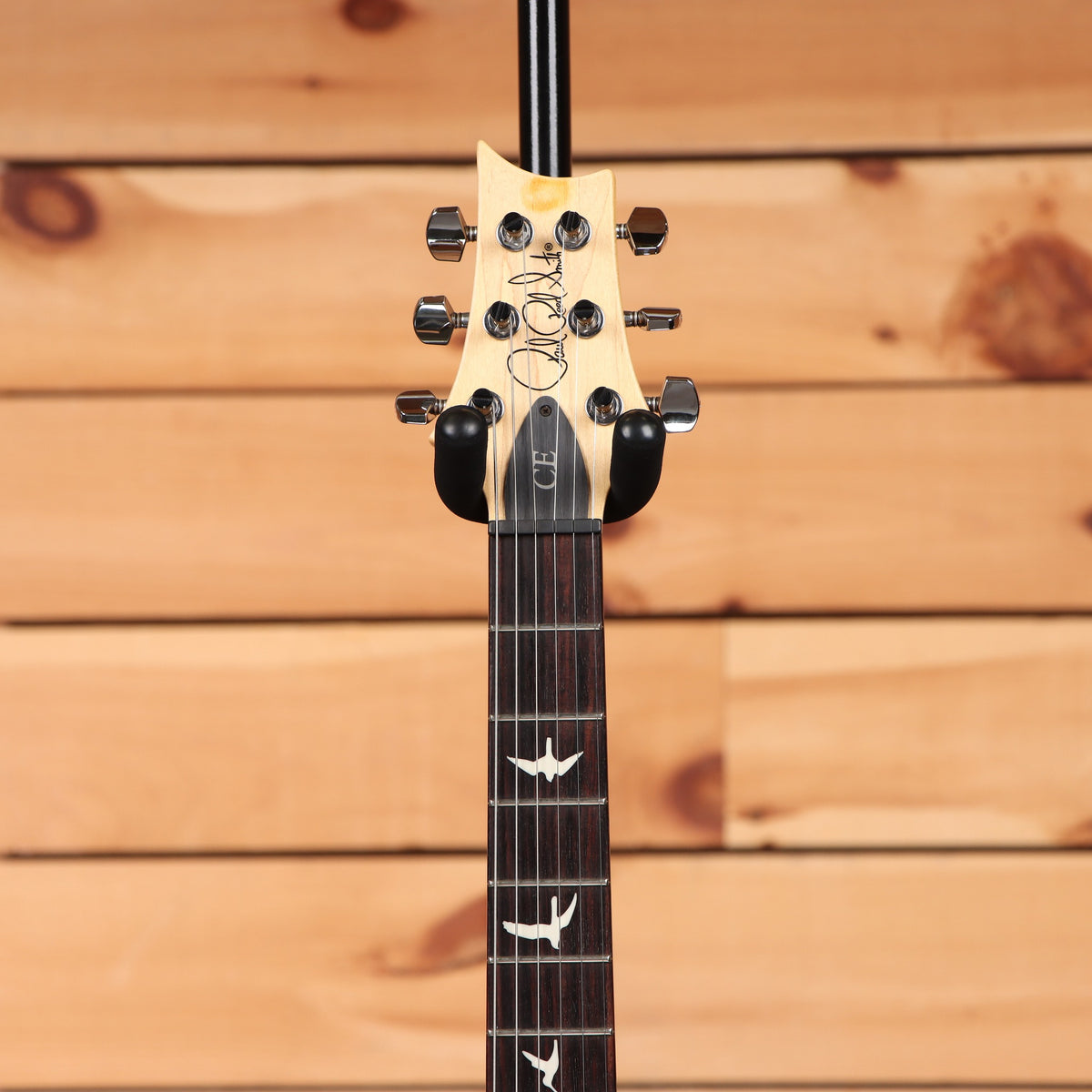 PRS CE-24 electric guitar McCarty Burst headstock with rosewood fretboard and bird inlays chrome tuners