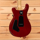 PRS CE-24 electric guitar McCarty Burst with maple neck and black tremolo cavity cover back view