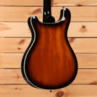PRS SE Hollowbody electric guitar Tobacco Sunburst with cream body binding shown from rear angle
