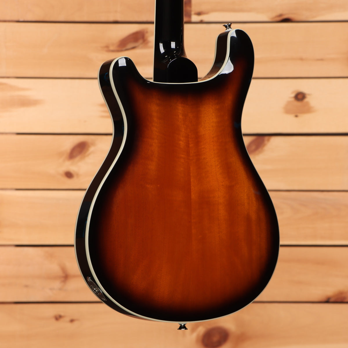 PRS SE Hollowbody electric guitar Tobacco Sunburst with cream body binding shown from rear angle