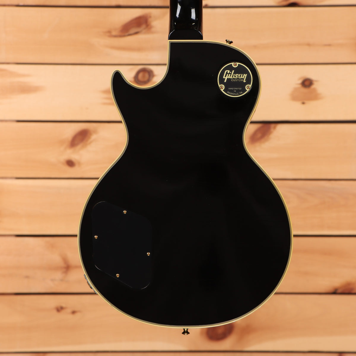 Gibson 1968 Les Paul Custom Reissue Light Aged electric guitar Ebony back view with gold hardware and cream binding