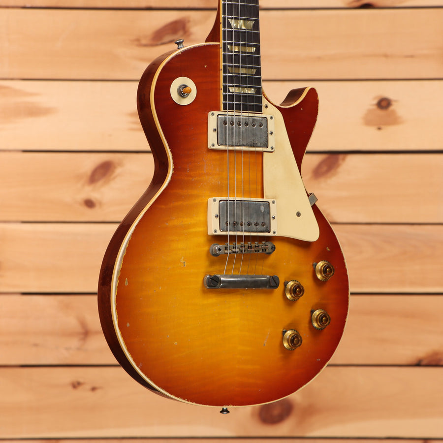 Gibson 1959 Les Paul Standard Reissue Heavy Aged electric guitar Faded Peach Burst with dual humbuckers and aged gold hardwar