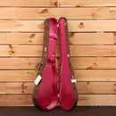 Gibson 1959 Les Paul Standard Reissue Heavy Aged hardshell case open showing pink interior lining and gold hardware latches