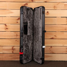 Fender American Professional Stratocaster hard-shell case open showing gray plush interior and black molded exterior