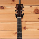 Martin 000-18 acoustic guitar Natural with Aging Toner featuring dark ebony fretboard and chrome tuners