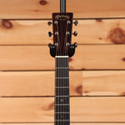 Martin 000-18 acoustic guitar Natural with Aging Toner featuring dark ebony fretboard and chrome tuners