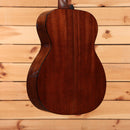 Martin 000-18 acoustic guitar Natural with Aging Toner showing solid mahogany back and sides with black binding