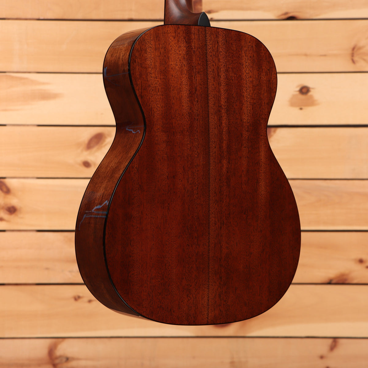 Martin 000-18 acoustic guitar Natural with Aging Toner showing solid mahogany back and sides with black binding