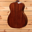 Martin 000-18 acoustic guitar Natural with Aging Toner showing solid mahogany back and sides with center seam