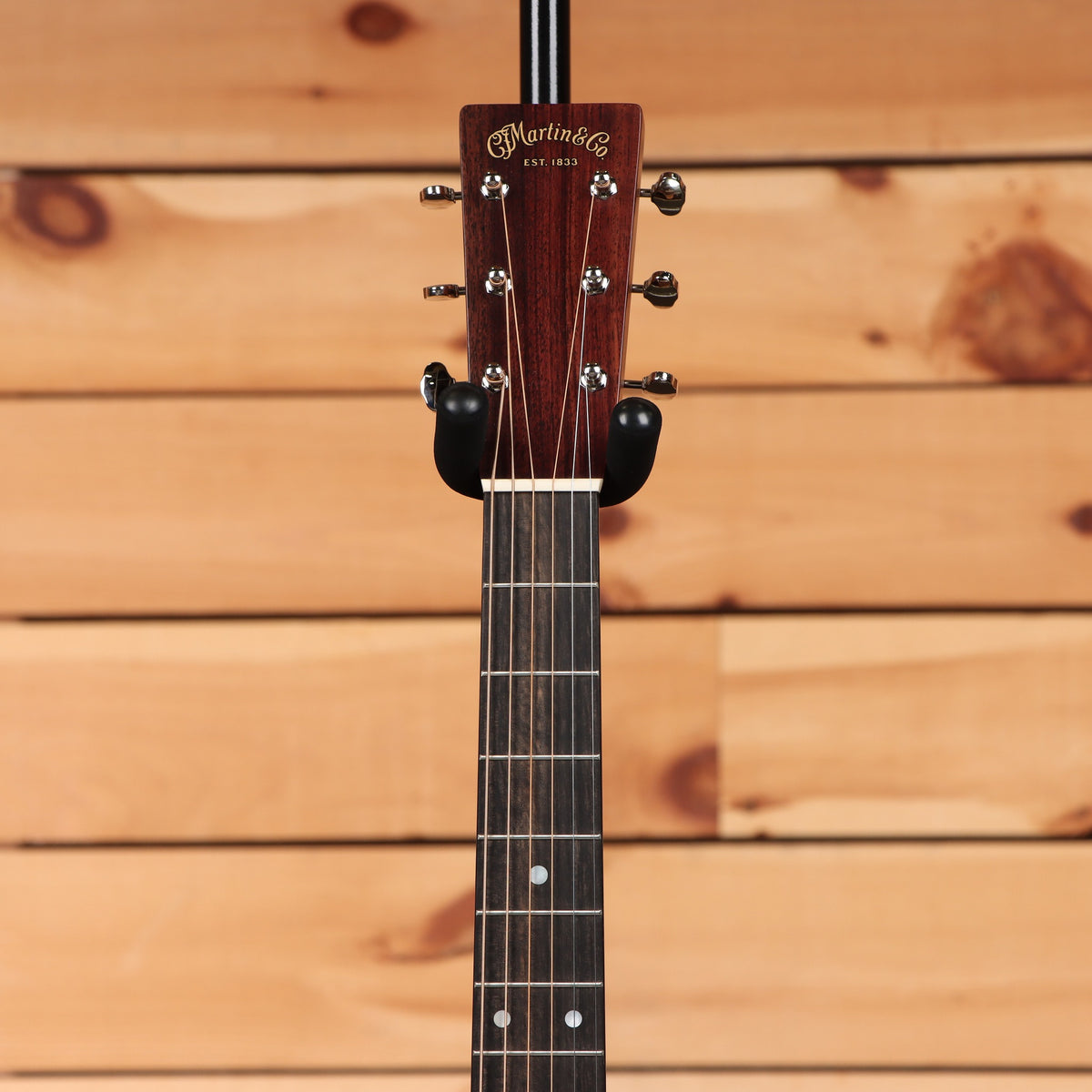 Martin D-28 dreadnought acoustic guitar Natural with Aging Toner featuring dark rosewood fretboard and chrome tuners