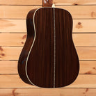 Martin D-28 dreadnought acoustic guitar Natural with Aging Toner showing rosewood back with herringbone center strip