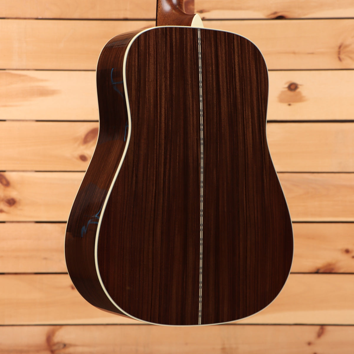 Martin D-28 dreadnought acoustic guitar Natural with Aging Toner showing rosewood back with herringbone center strip